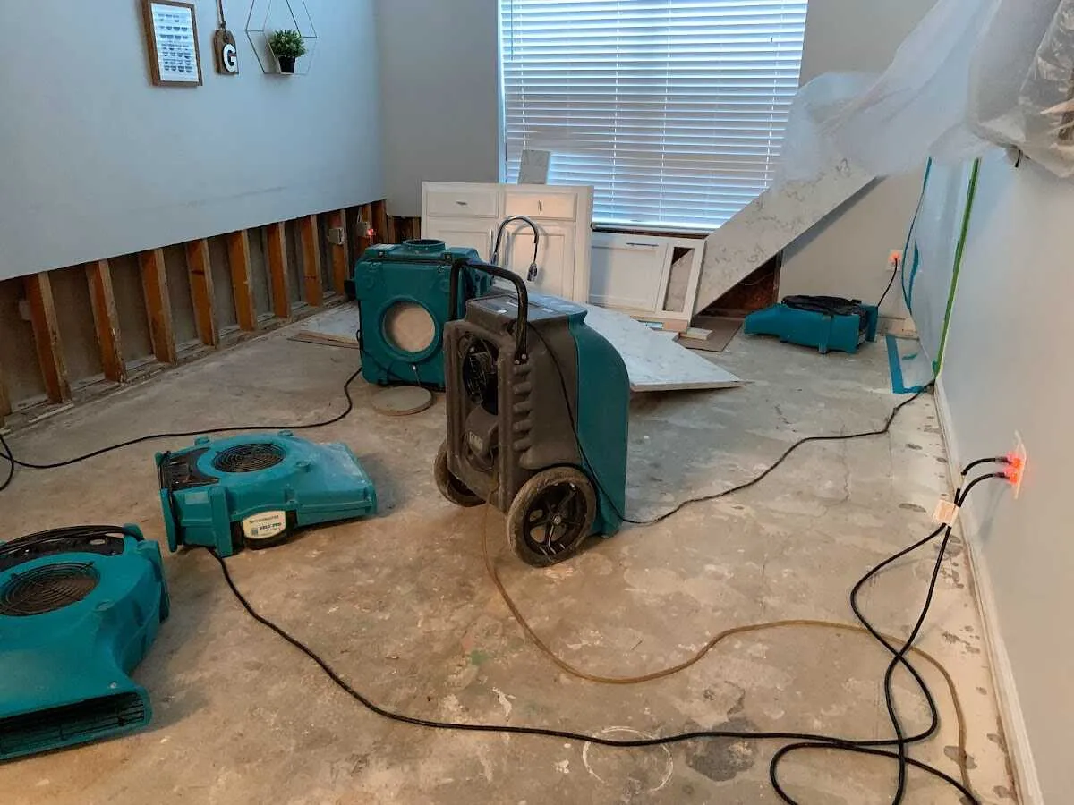 Dehumidifier in flood-cut room for Water Damage Restoration in Ashburn
